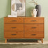 Cómoda moderna Sloane de madera maciza con 6 cajones y tiradores de metal