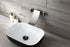 Grifo para lavabo de baño en cascada de níquel cepillado con desagüe emergente de latón y montaje en pared.