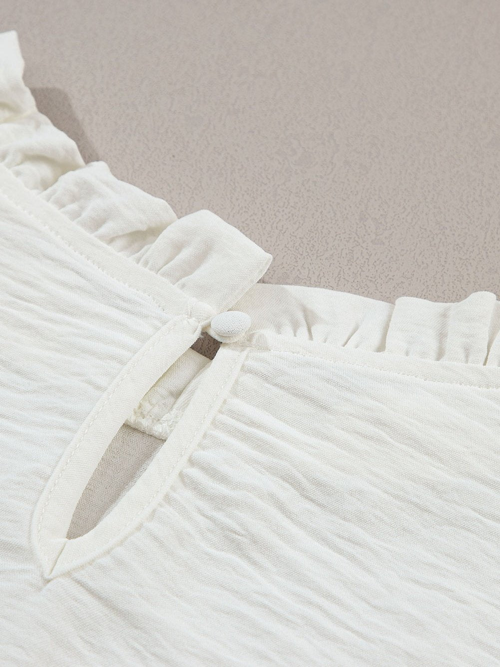 Flowy White Blouse with Ruffle Trim