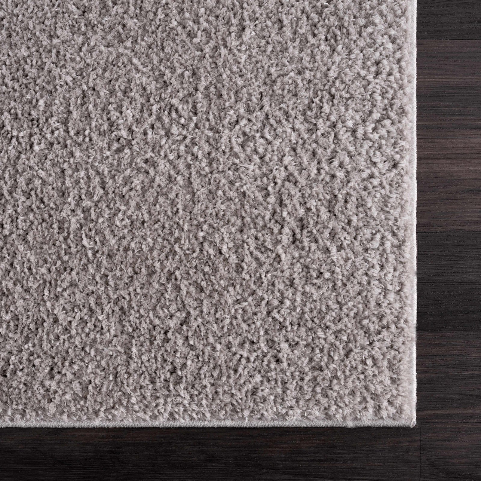 Alfombra peluda lavable Judy de color gris liso
