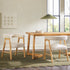Silla de comedor moderna Ezra de madera maciza con tapizado de bouclé (juego de 2)