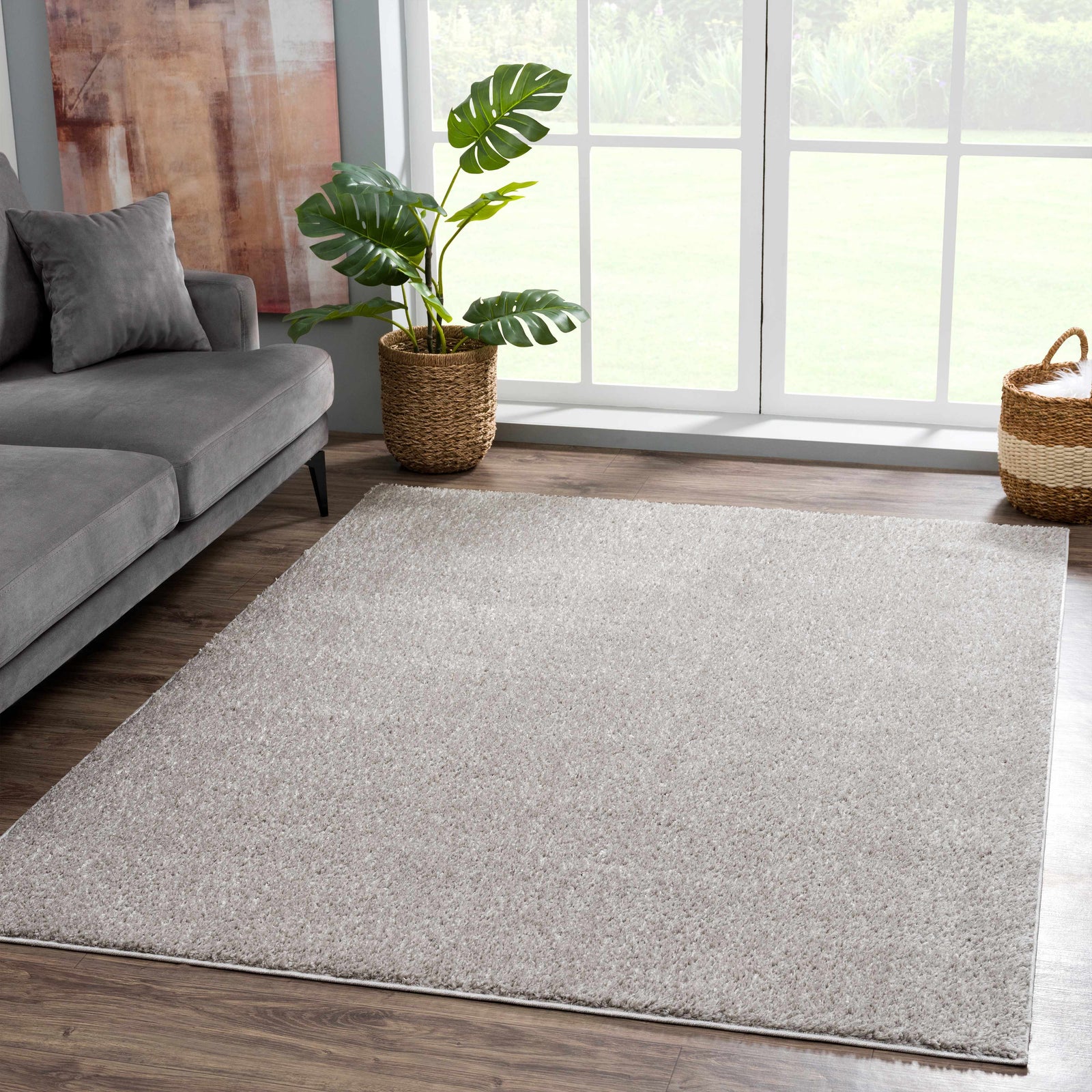 Alfombra peluda lavable Judy de color gris liso