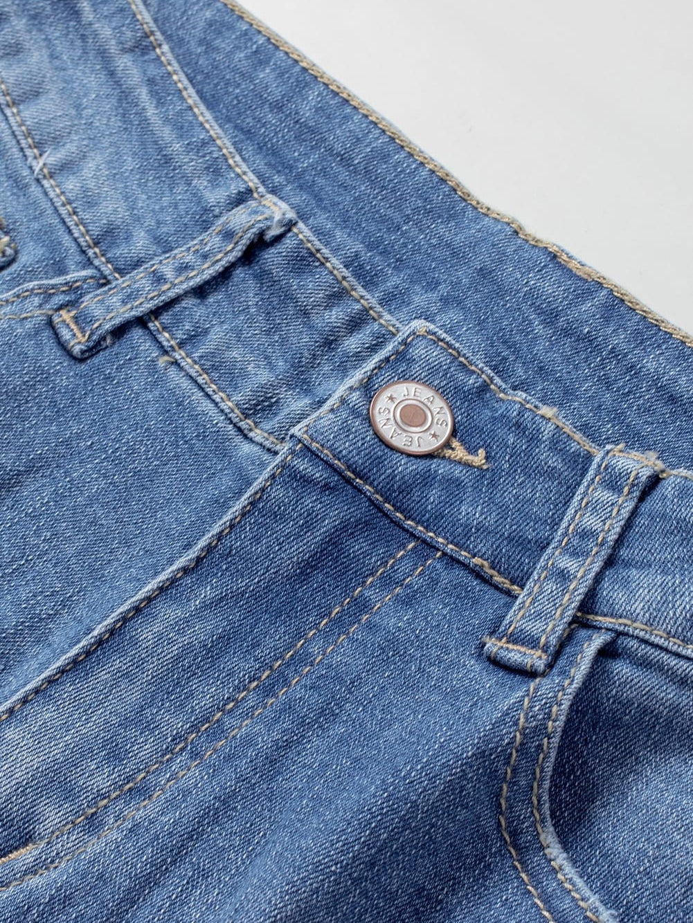 Trendy Ripped Denim Shorts with Unique Floral Design