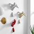 Conjunto de tres esculturas Wall Runners // Rojo metalizado, dorado y cromado