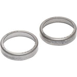 Two metallic bearings on a white background