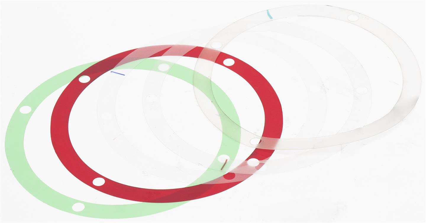 Two circular gaskets, one red and one green, on a white background.