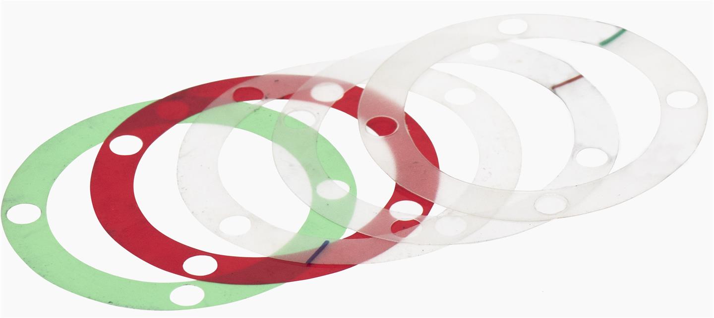Three circular gaskets in red, green, and white on a white background