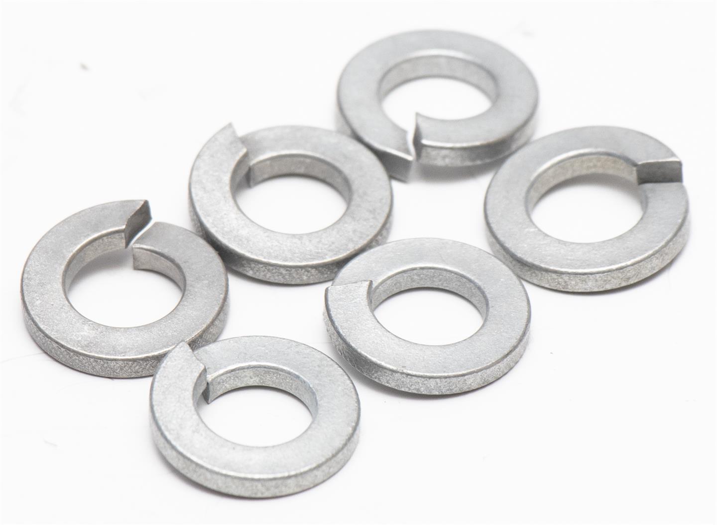 Set of metal washers on a white background