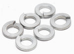 Set of metal washers on a white background