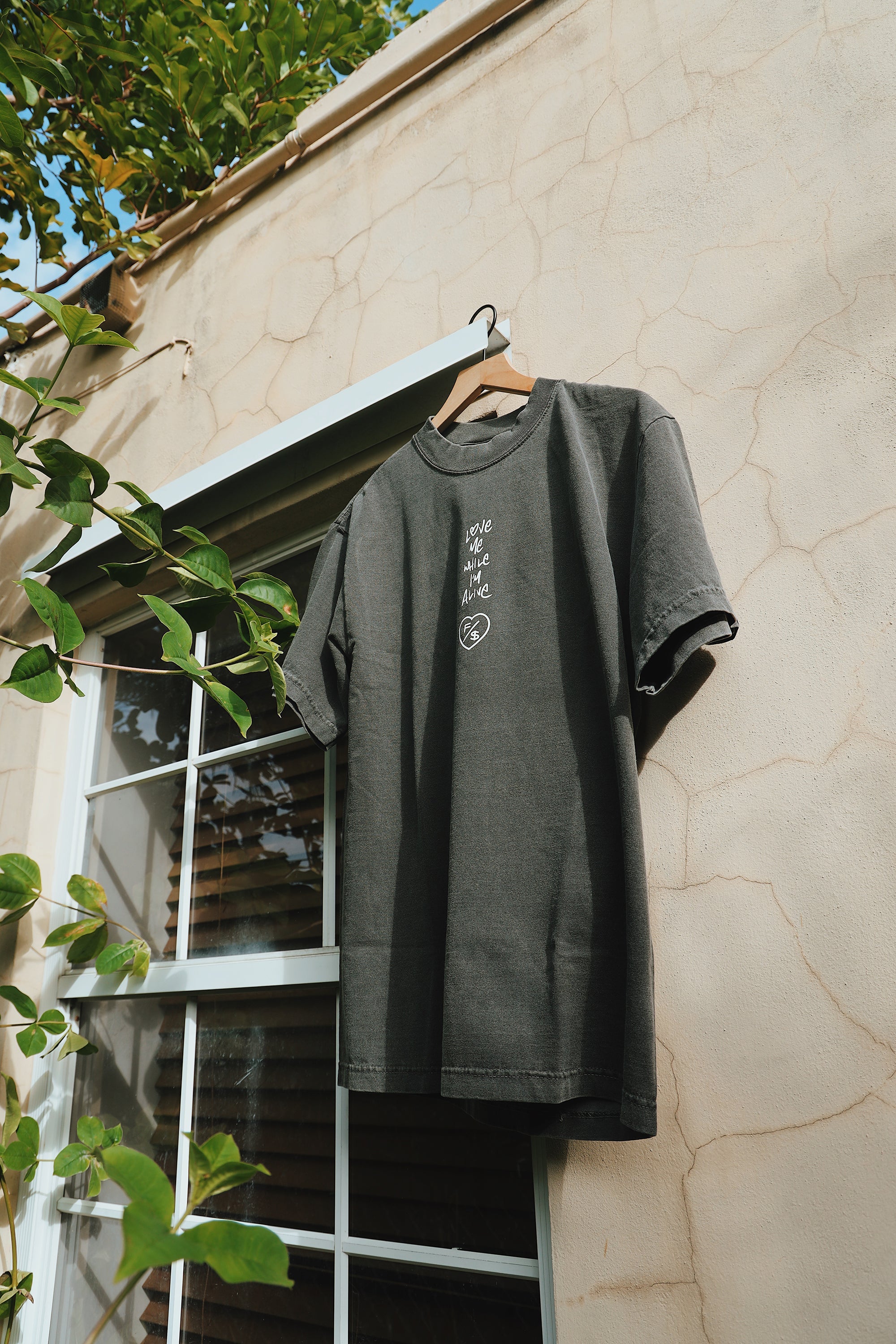 Love Me While I'm Alive T Shirts