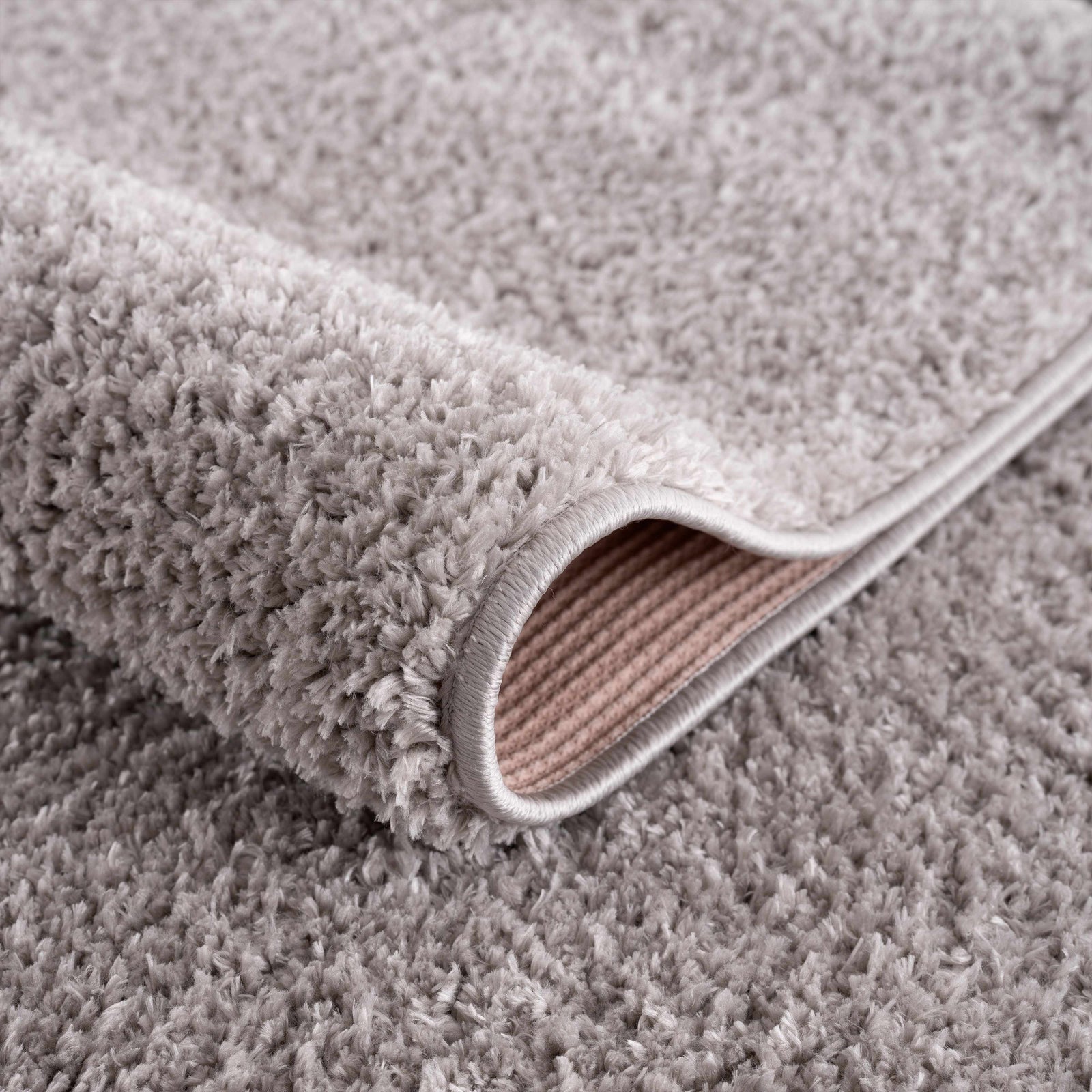Alfombra peluda lavable Judy de color gris liso