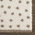 Alfombra de felpa con lunares color crema y marrón de Chaia