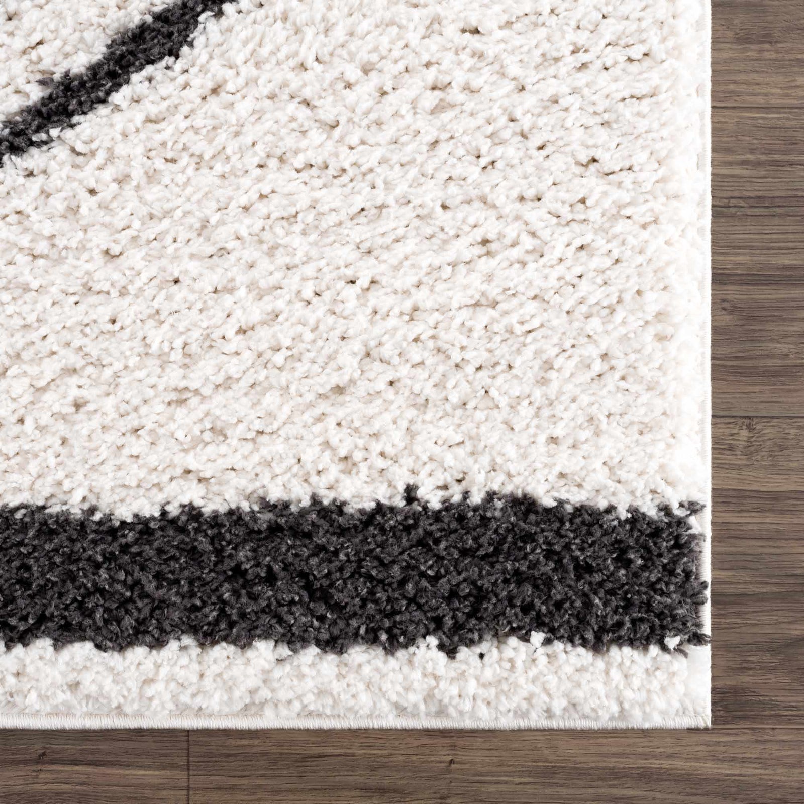 Alfombra de felpa negra con arcoíris de Bauer - Ofertas especiales