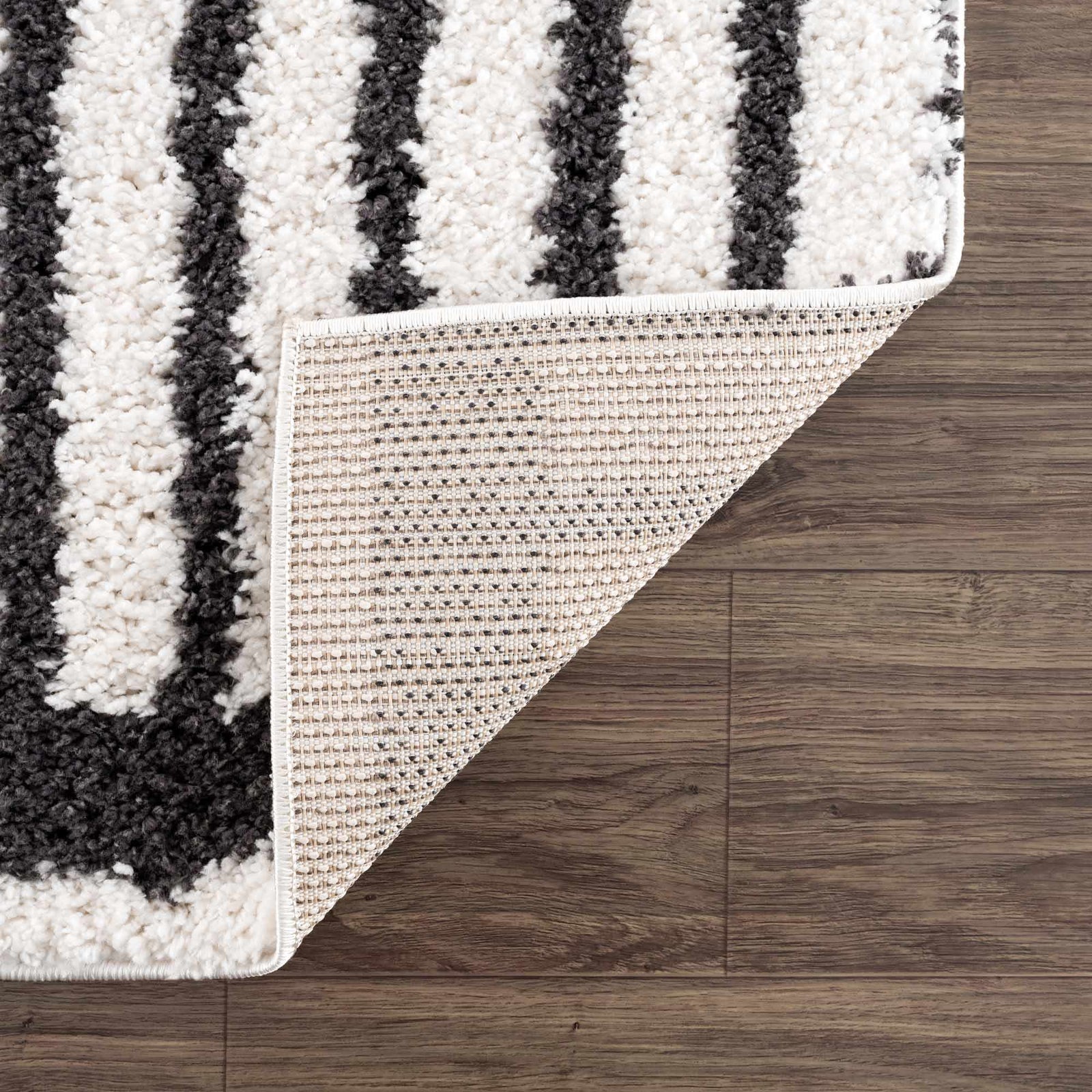 Alfombra de felpa negra con arcoíris de Bauer - Ofertas especiales