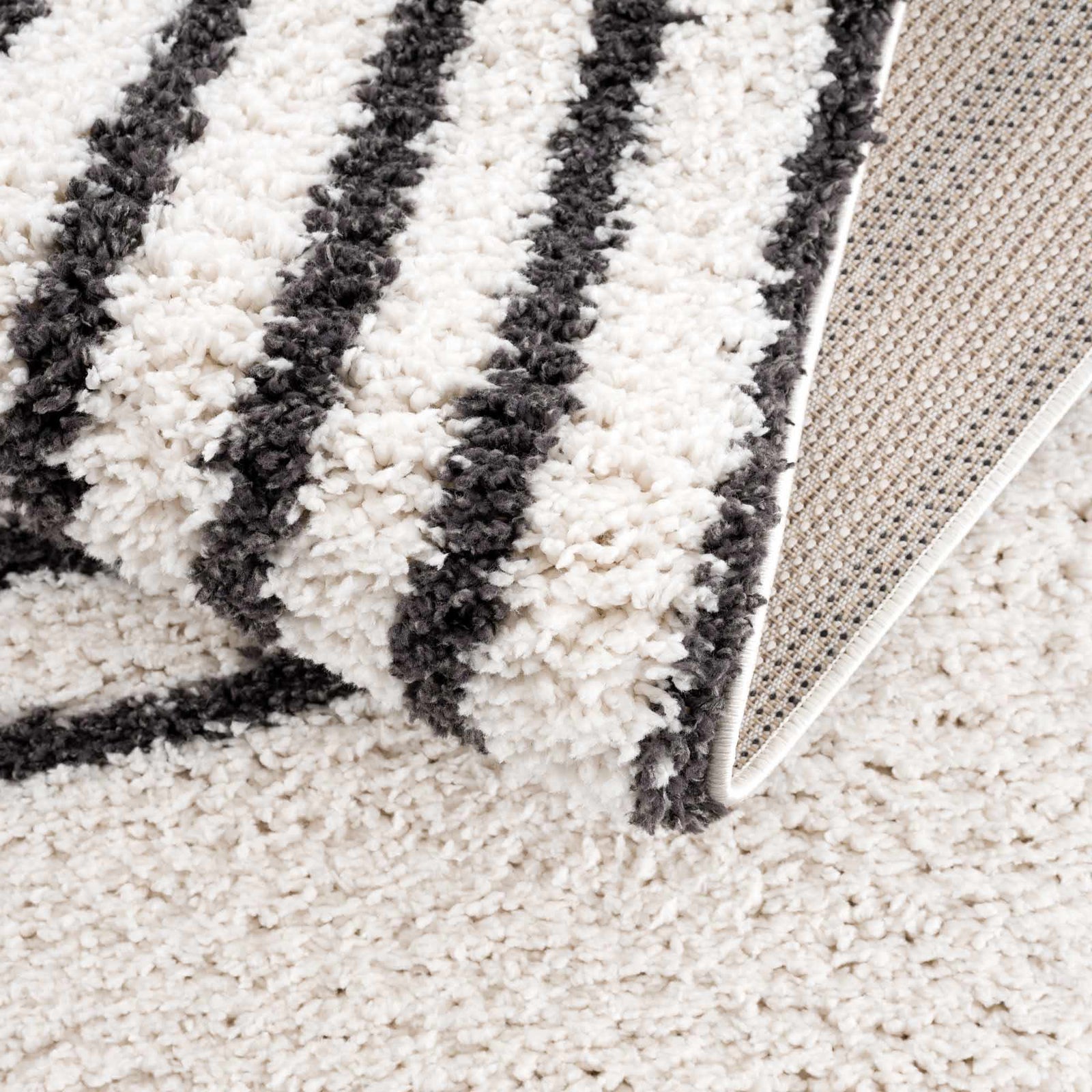 Alfombra de felpa negra con arcoíris de Bauer - Ofertas especiales