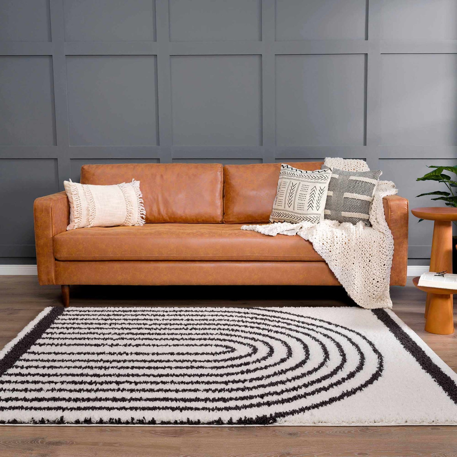 Alfombra de felpa negra con arcoíris de Bauer - Ofertas especiales