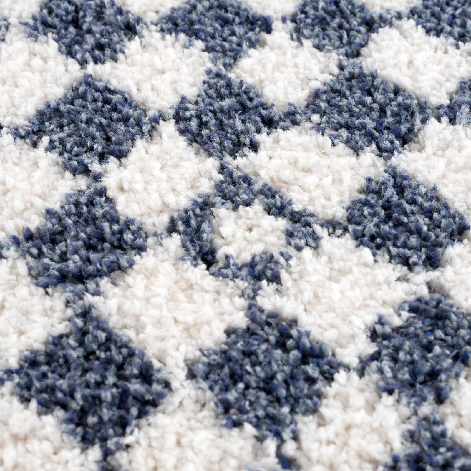 Alfombra de cuadros blancos y azules de Kieu