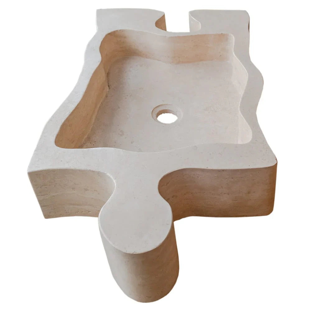 Lavabo de baño con forma de rompecabezas de travertino beige de piedra natural sobre tocador