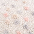 Alfombra con lunares en color rosa y crema de Cansu