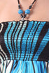Vestido con escote halter, fruncido y dobladillo tipo pañuelo, con cuentas y tacto satinado en diseño de remolino
