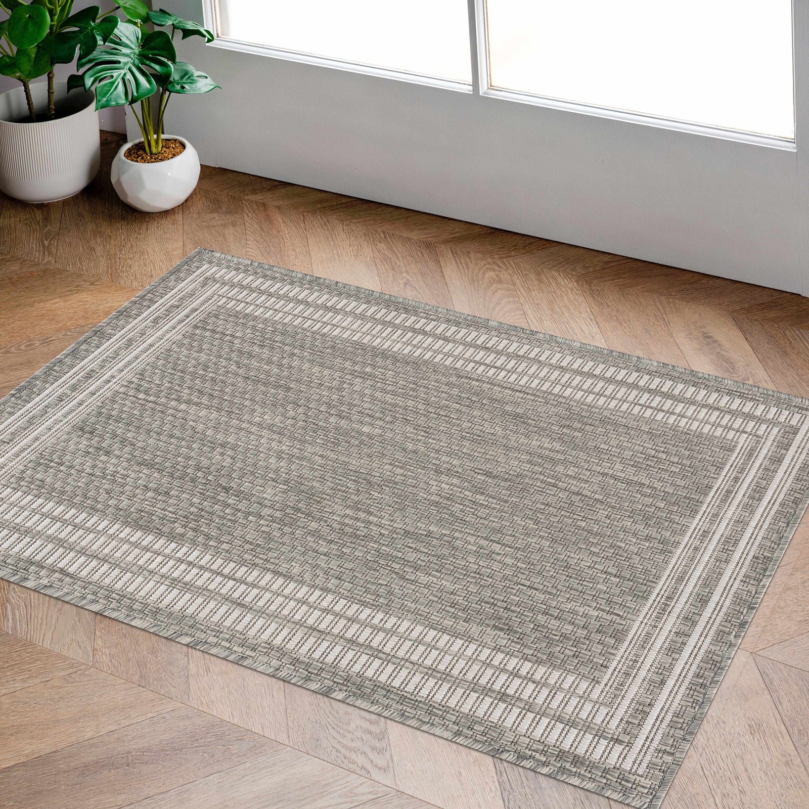 Alfombra beige con borde Burradoo