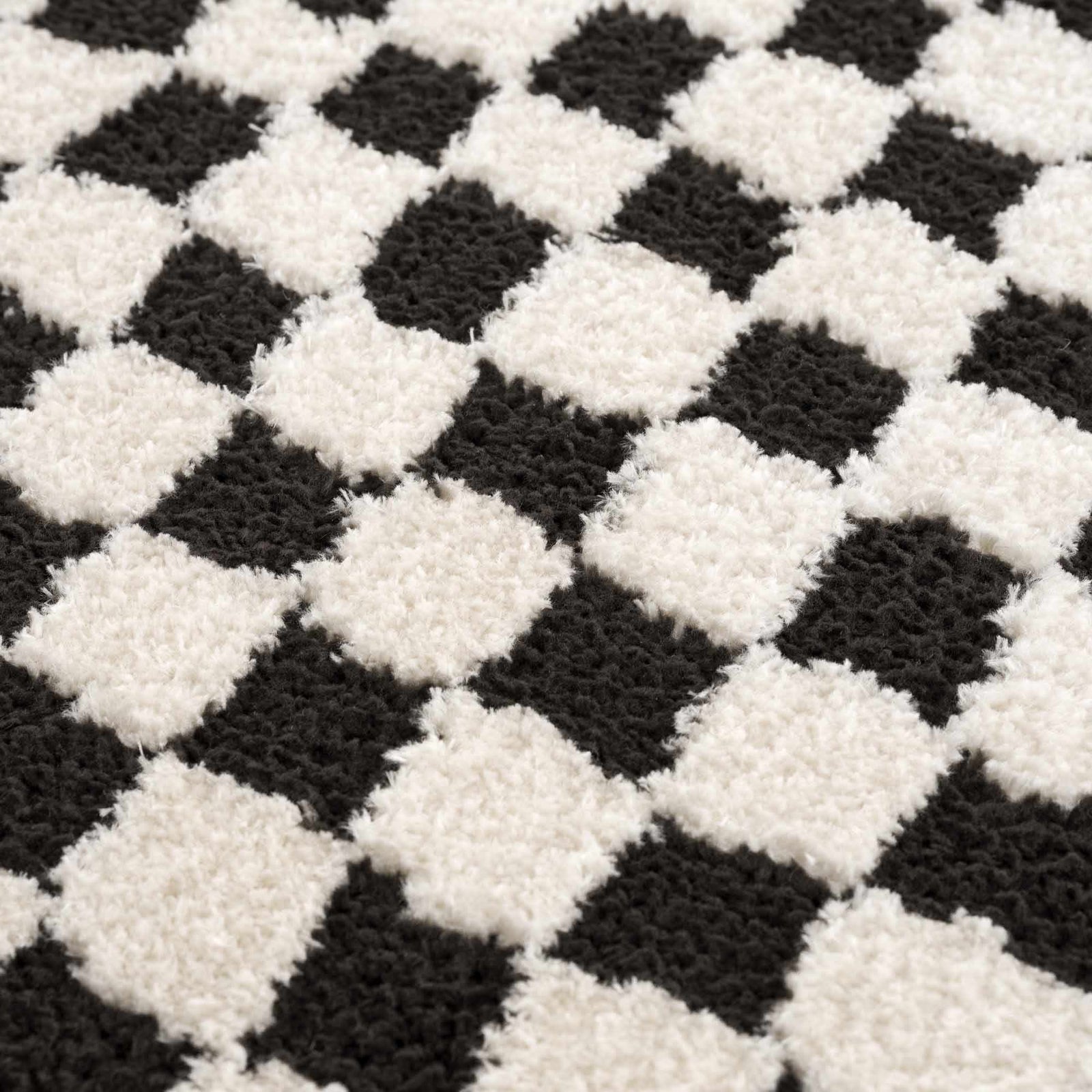 Alfombra de cuadros blancos y negros Leryn