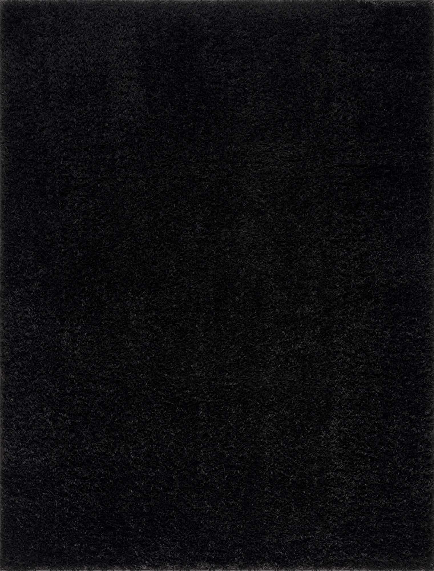 Alfombra peluda Faina de color negro liso lavable