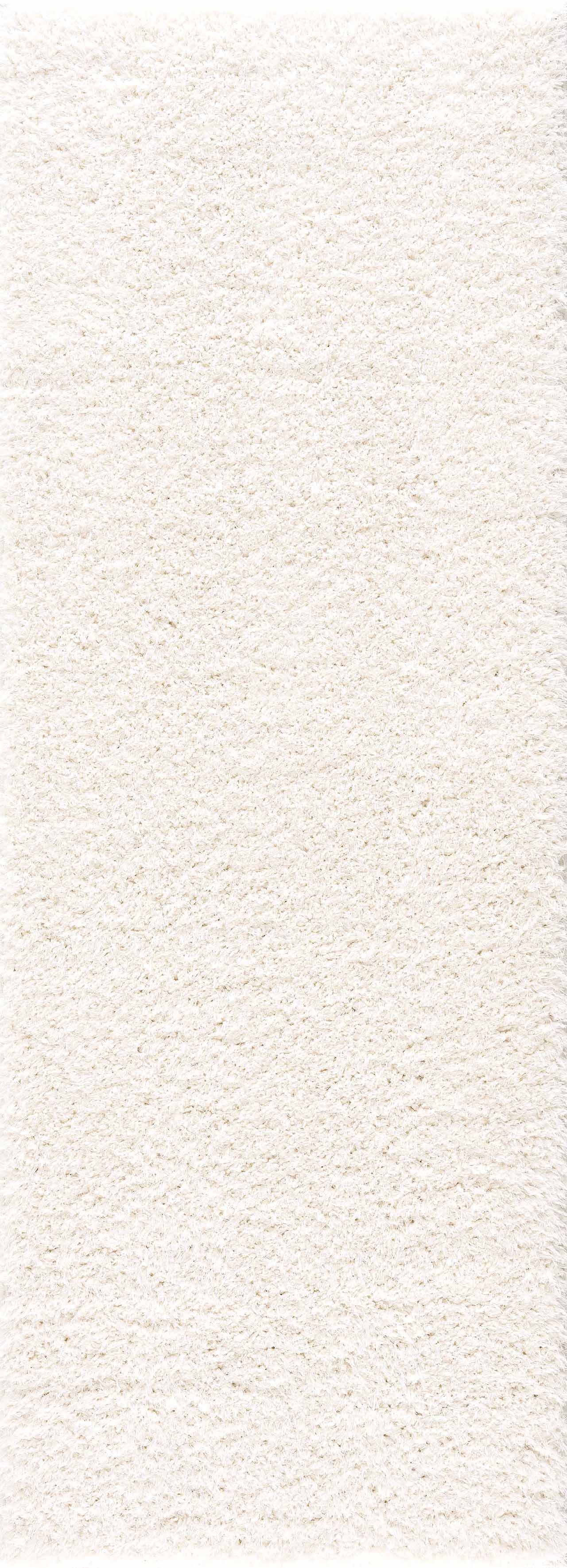 Alfombra peluda Faina de color crema sólido lavable