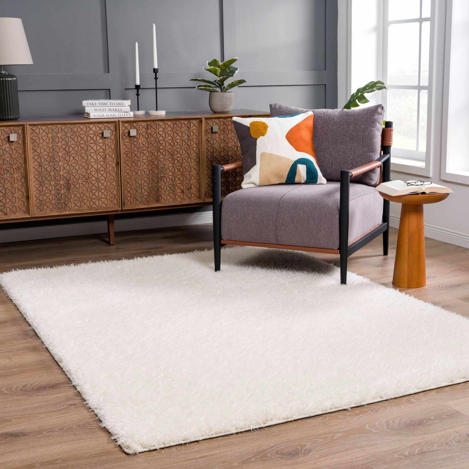 Alfombra peluda Faina de color crema sólido lavable