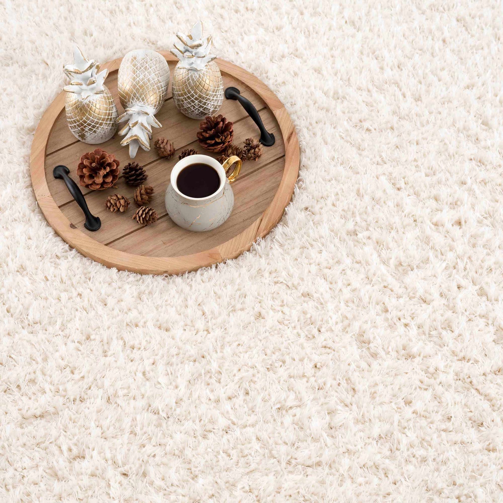 Alfombra peluda Faina de color crema sólido lavable