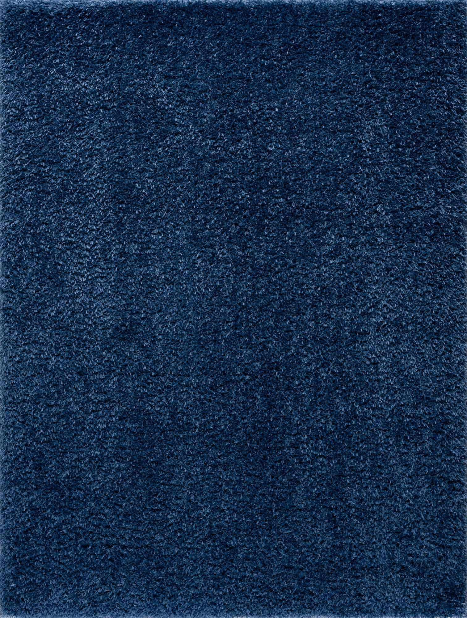Alfombra peluda Faina de color azul oscuro liso lavable