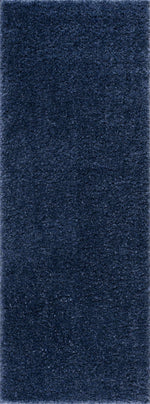 Alfombra peluda Faina de color azul oscuro liso lavable