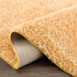 Alfombra de pelo largo Faina Solid Gold lavable