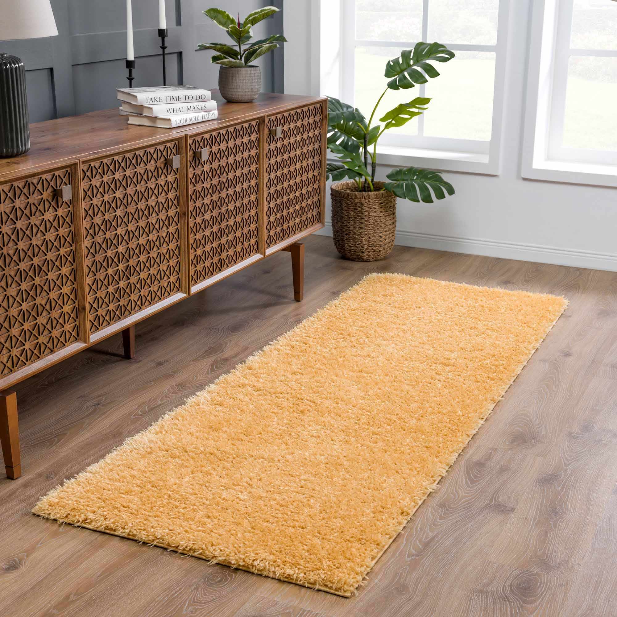 Alfombra de pelo largo Faina Solid Gold lavable