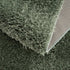 Alfombra peluda lavable Faina de color verde sólido
