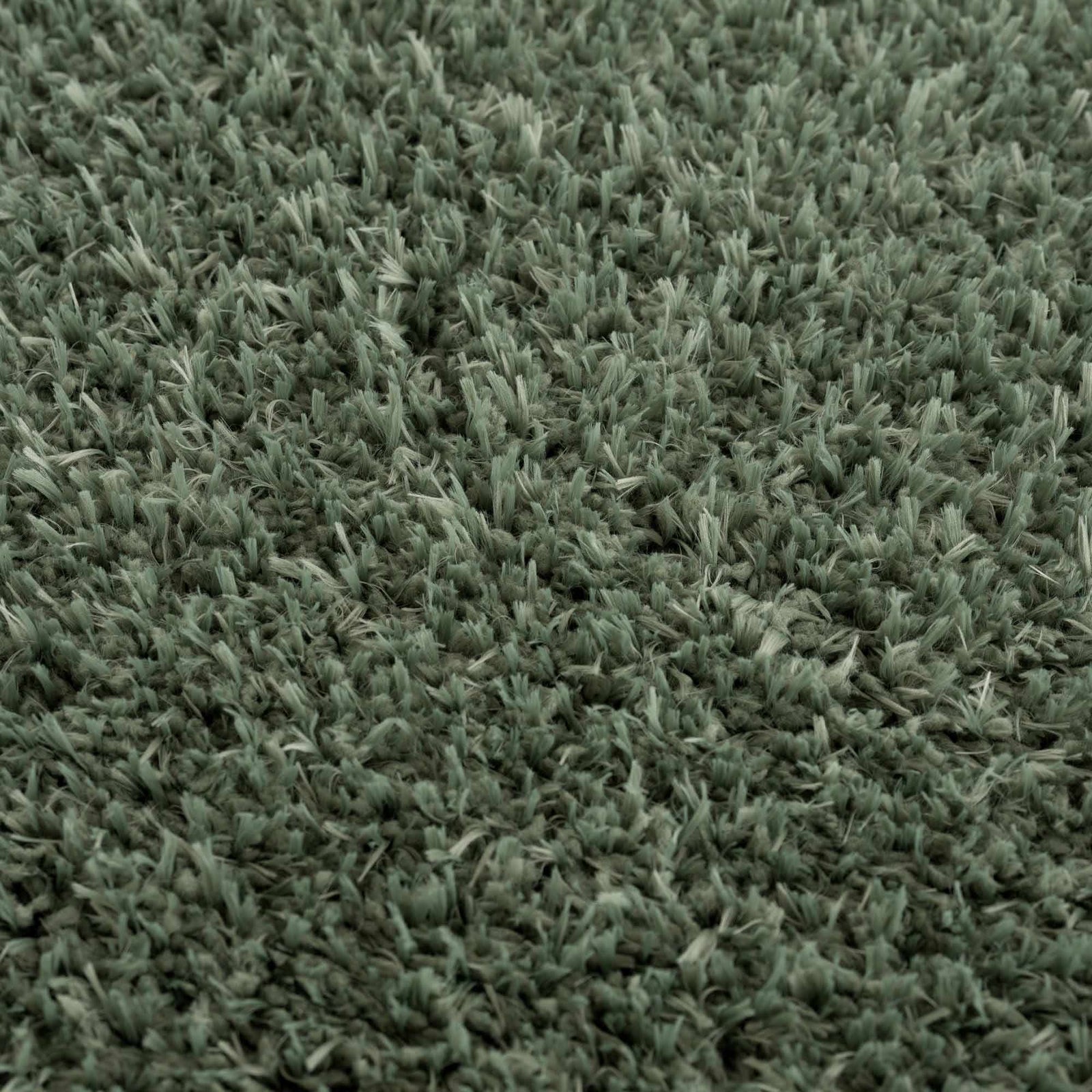 Alfombra peluda lavable Faina de color verde sólido