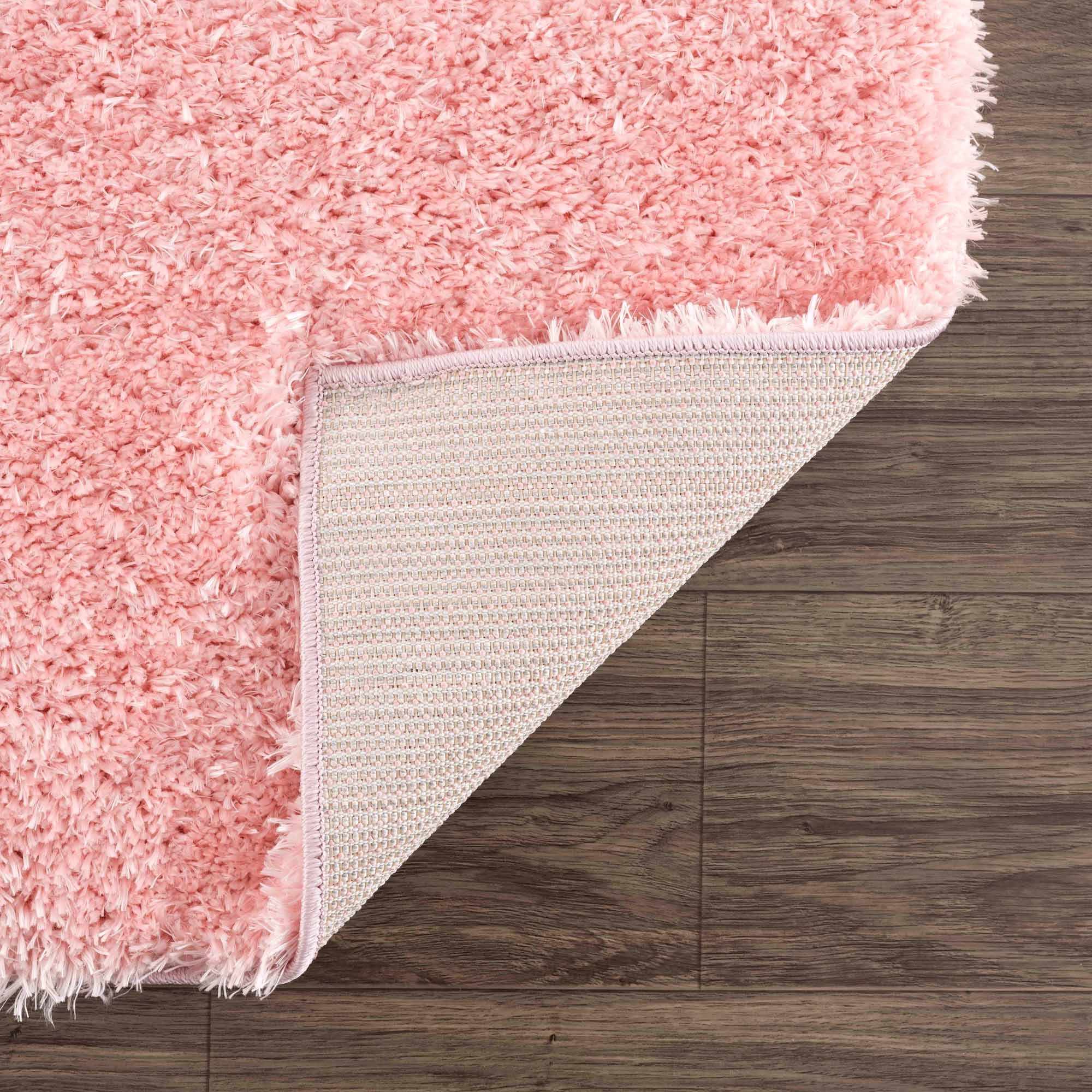 Alfombra peluda lavable Faina de color rosa sólido
