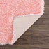 Alfombra peluda lavable Faina de color rosa sólido