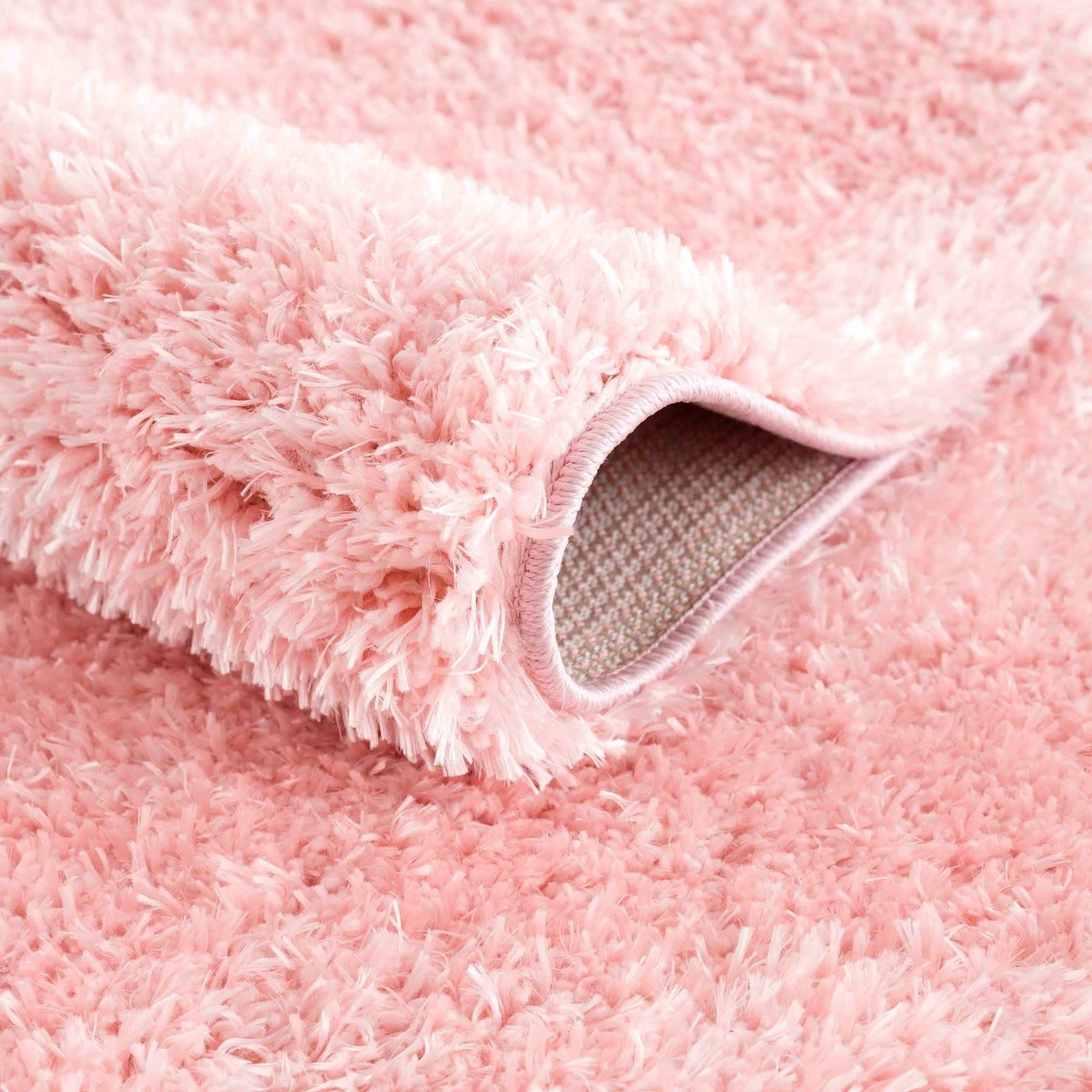 Alfombra peluda lavable Faina de color rosa sólido