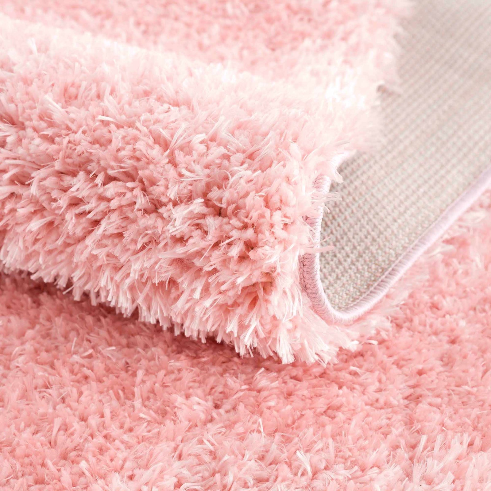 Alfombra peluda lavable Faina de color rosa sólido