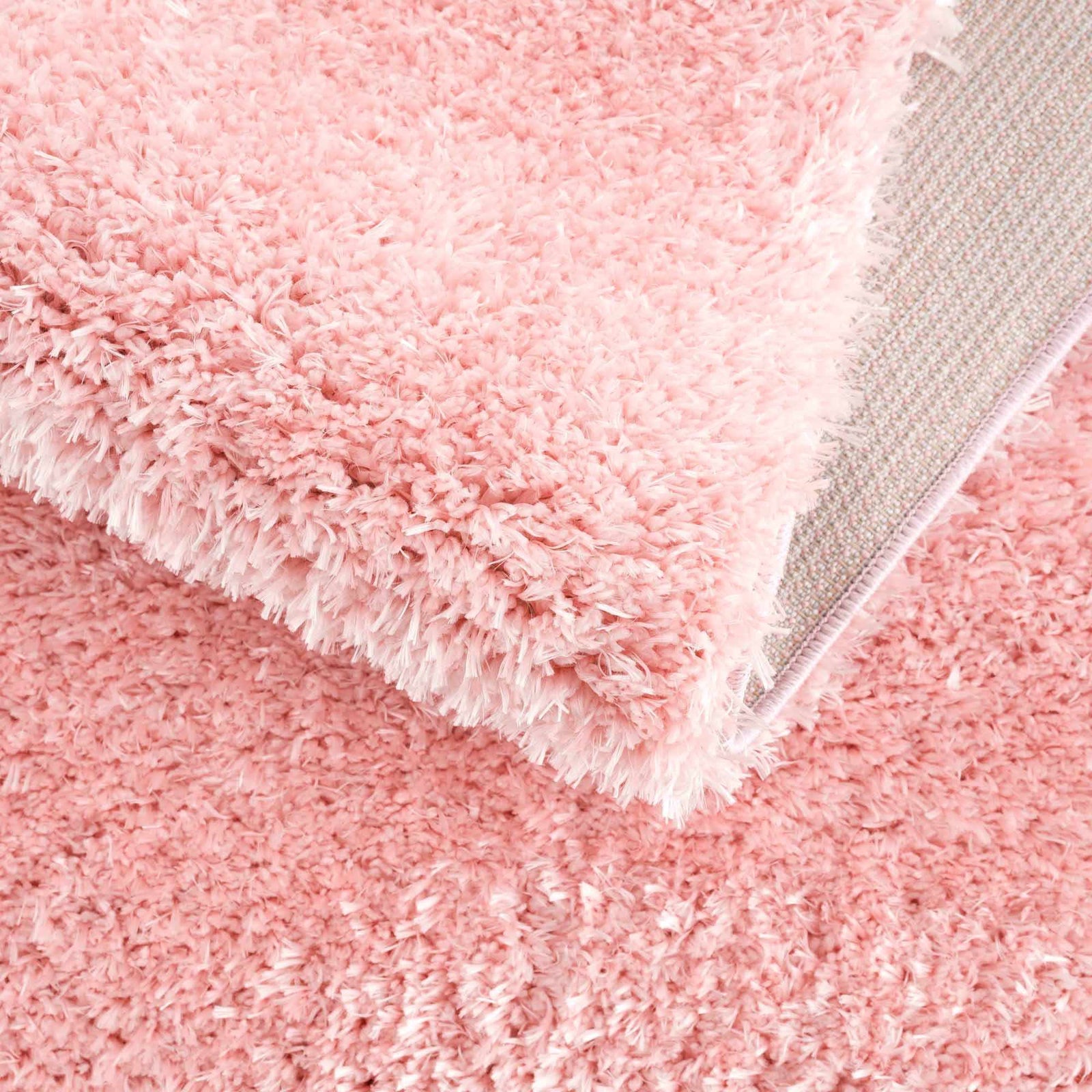 Alfombra peluda lavable Faina de color rosa sólido