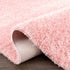 Alfombra peluda lavable Faina de color rosa sólido