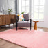 Alfombra peluda lavable Faina de color rosa sólido