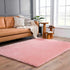 Alfombra peluda lavable Faina de color rosa sólido