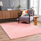 Alfombra peluda lavable Faina de color rosa sólido