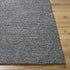 Winta Black Wool Area Rug