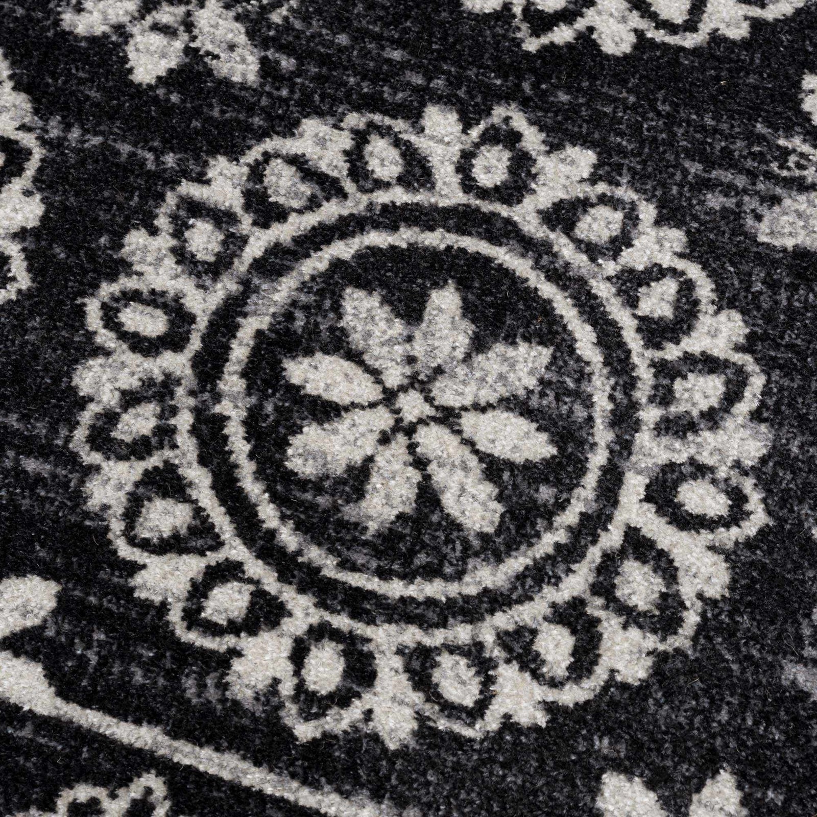 Alfombra lavable con diseño floral en blanco y negro de Kahraman