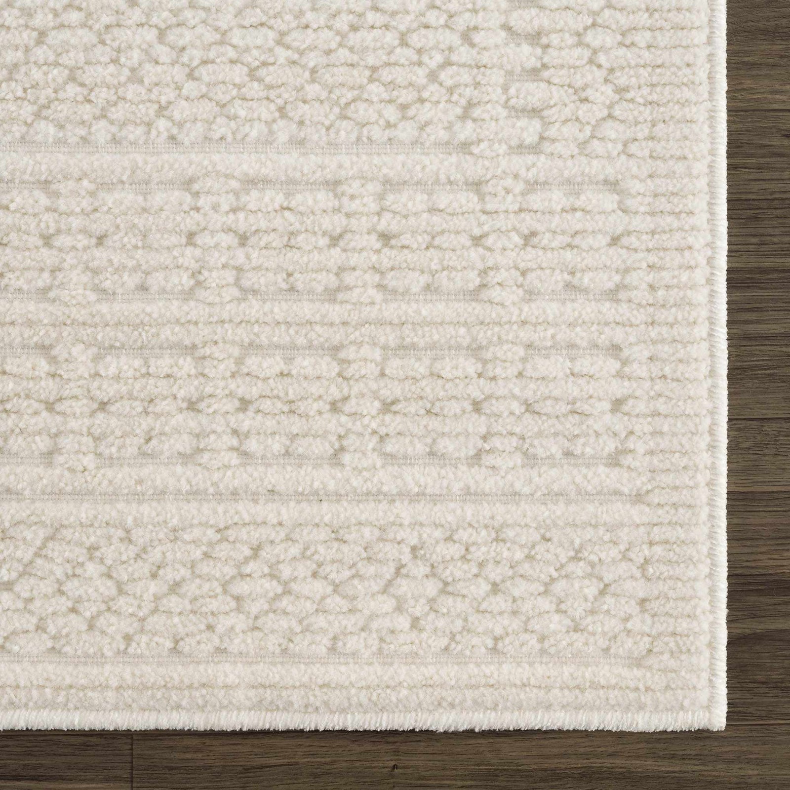 Alfombra lavable de color crema Bahar