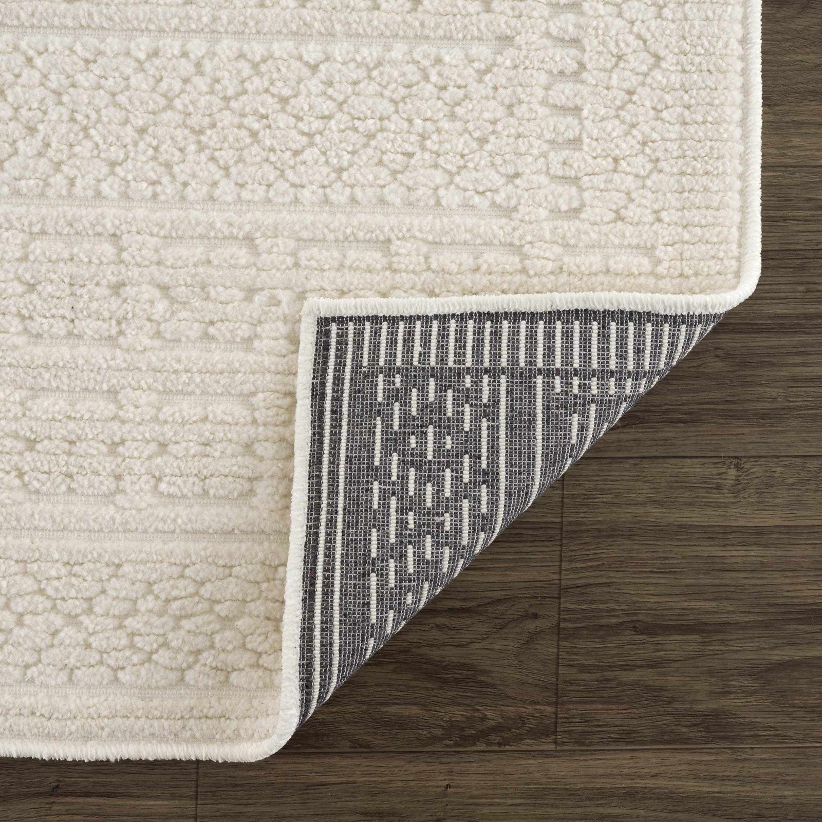 Alfombra lavable de color crema Bahar