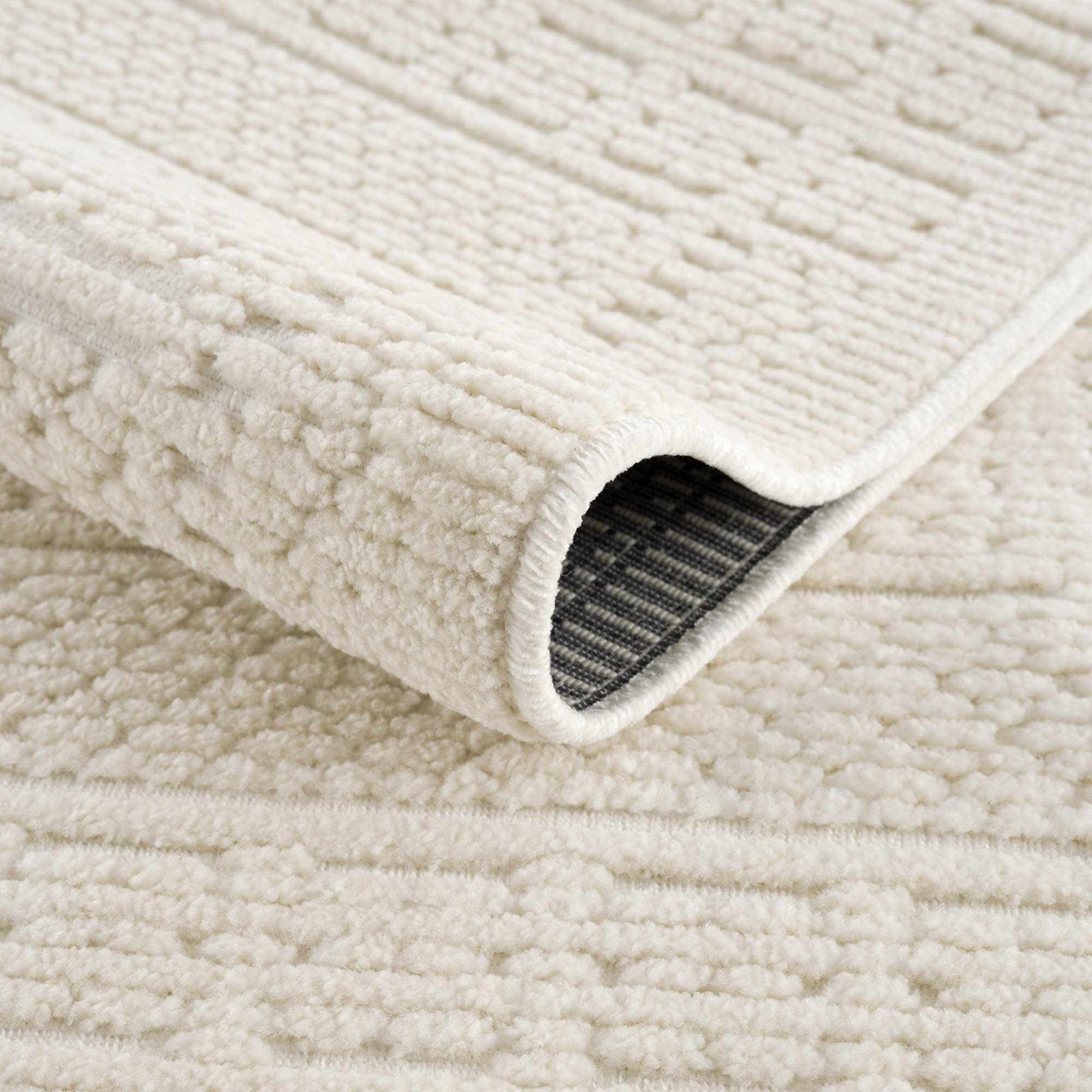 Alfombra lavable de color crema Bahar
